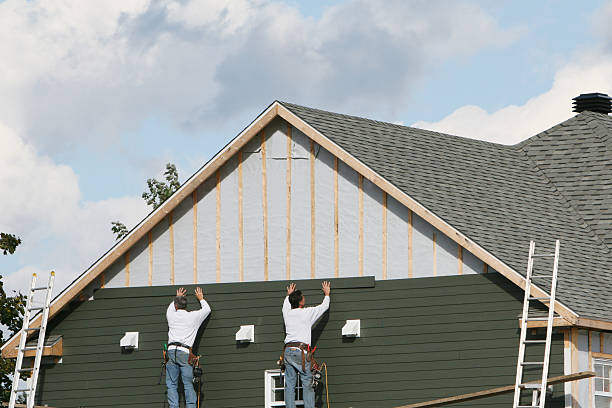 Professional Siding Contractor technician working in Peyton, CO
